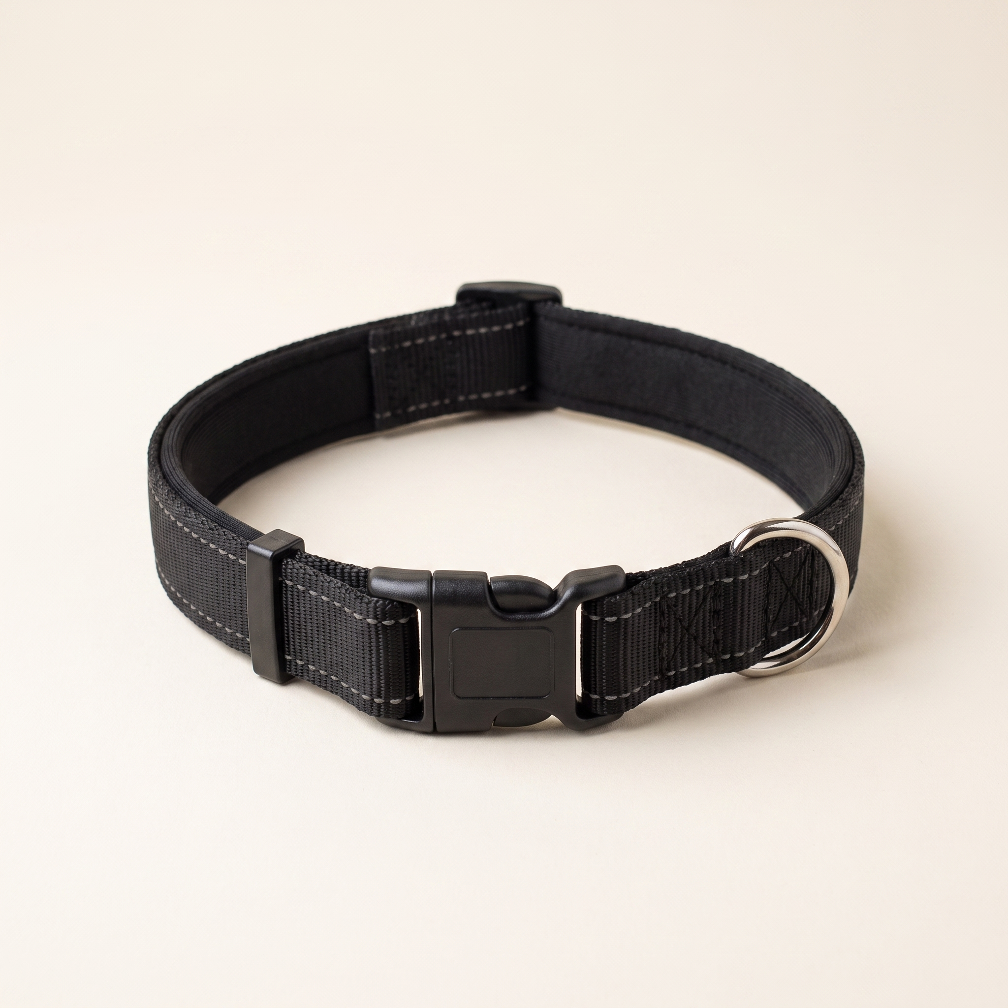 WANDRA Core Collar in Black, padded nylon dog collar with side-release buckle, metal D-ring and reflective stitching