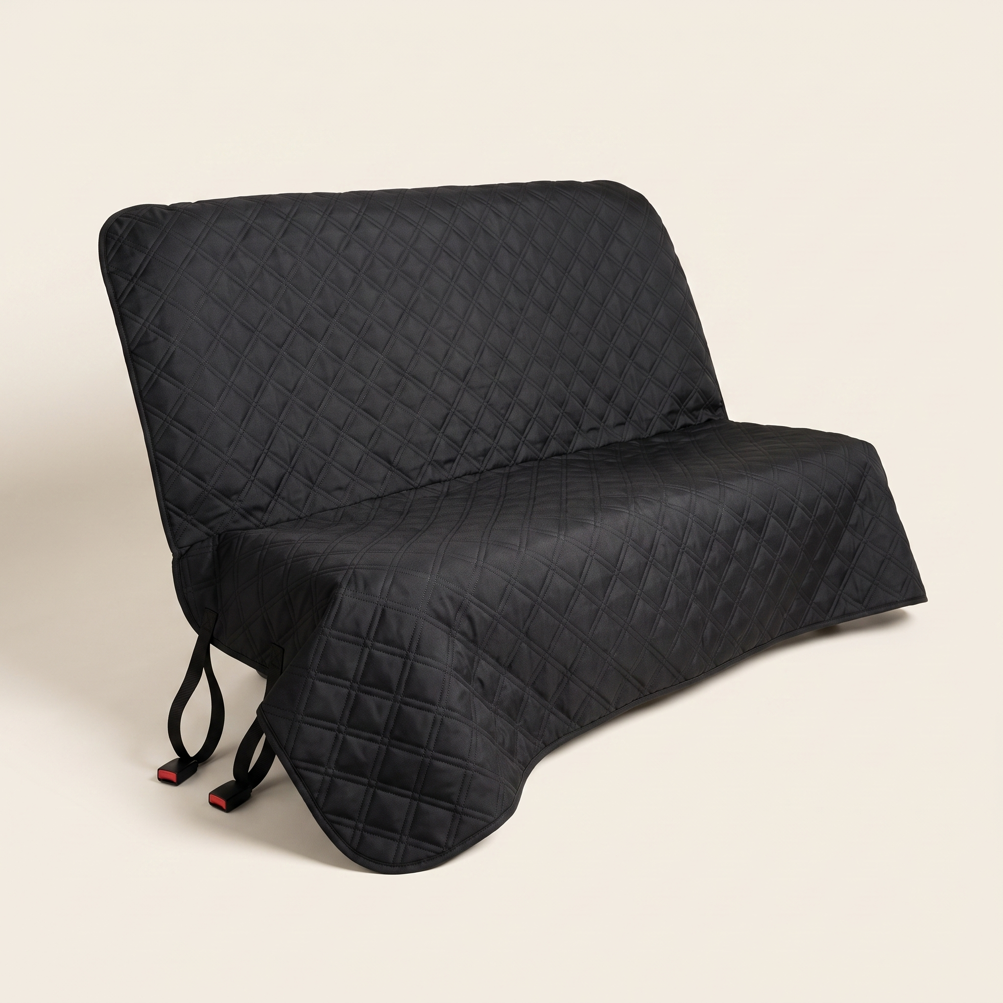 WANDRA Seat Cover in Black, quilted car rear bench seat cover with diamond lattice stitching and red seatbelt-style buckle straps