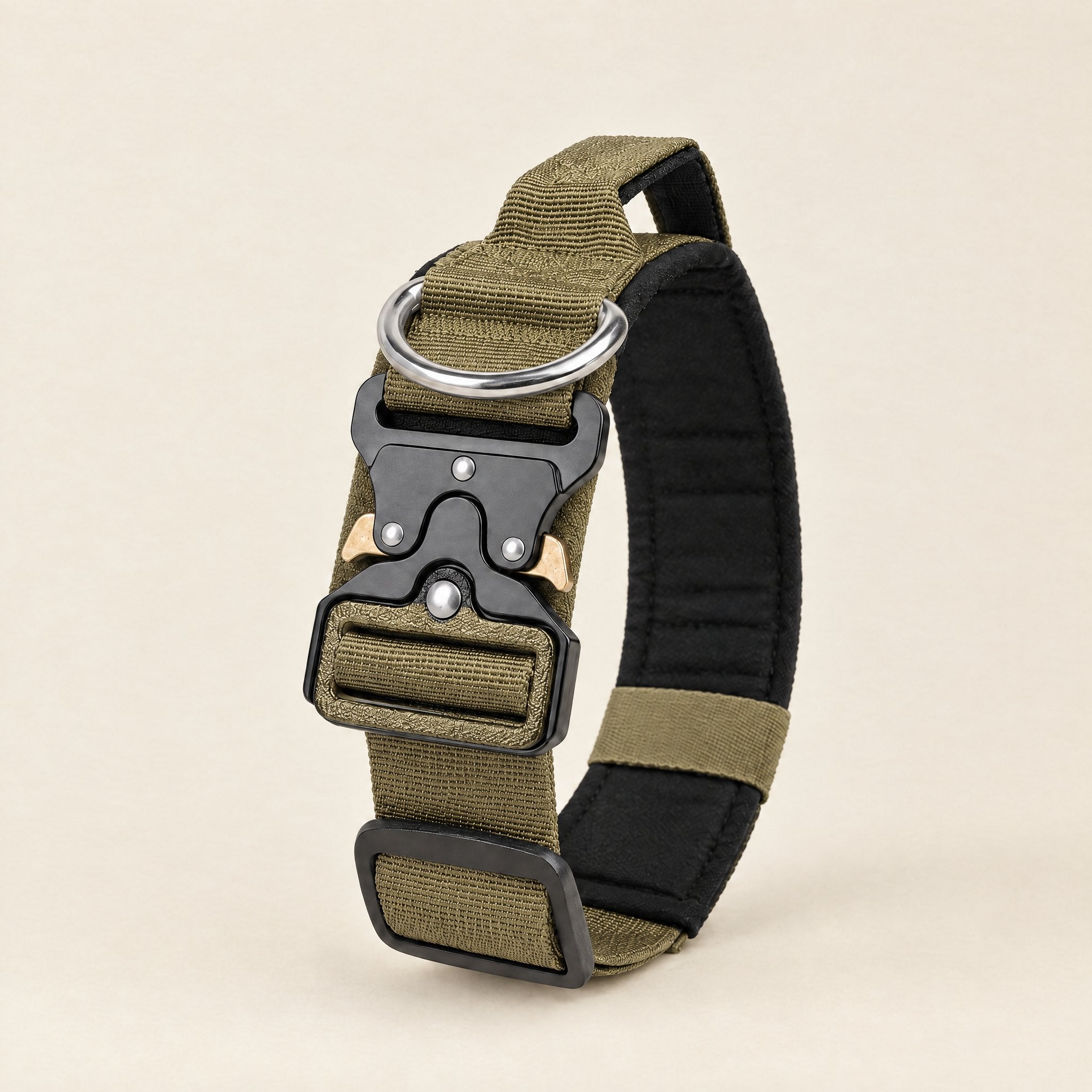 Wandra Crag Collar in Stone, a muted olive-khaki padded dog collar with a metal quick-release buckle and built-in handle